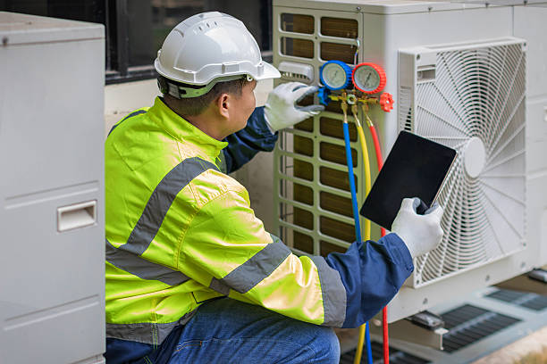 Professional Hvac technician working in Elmore, AL